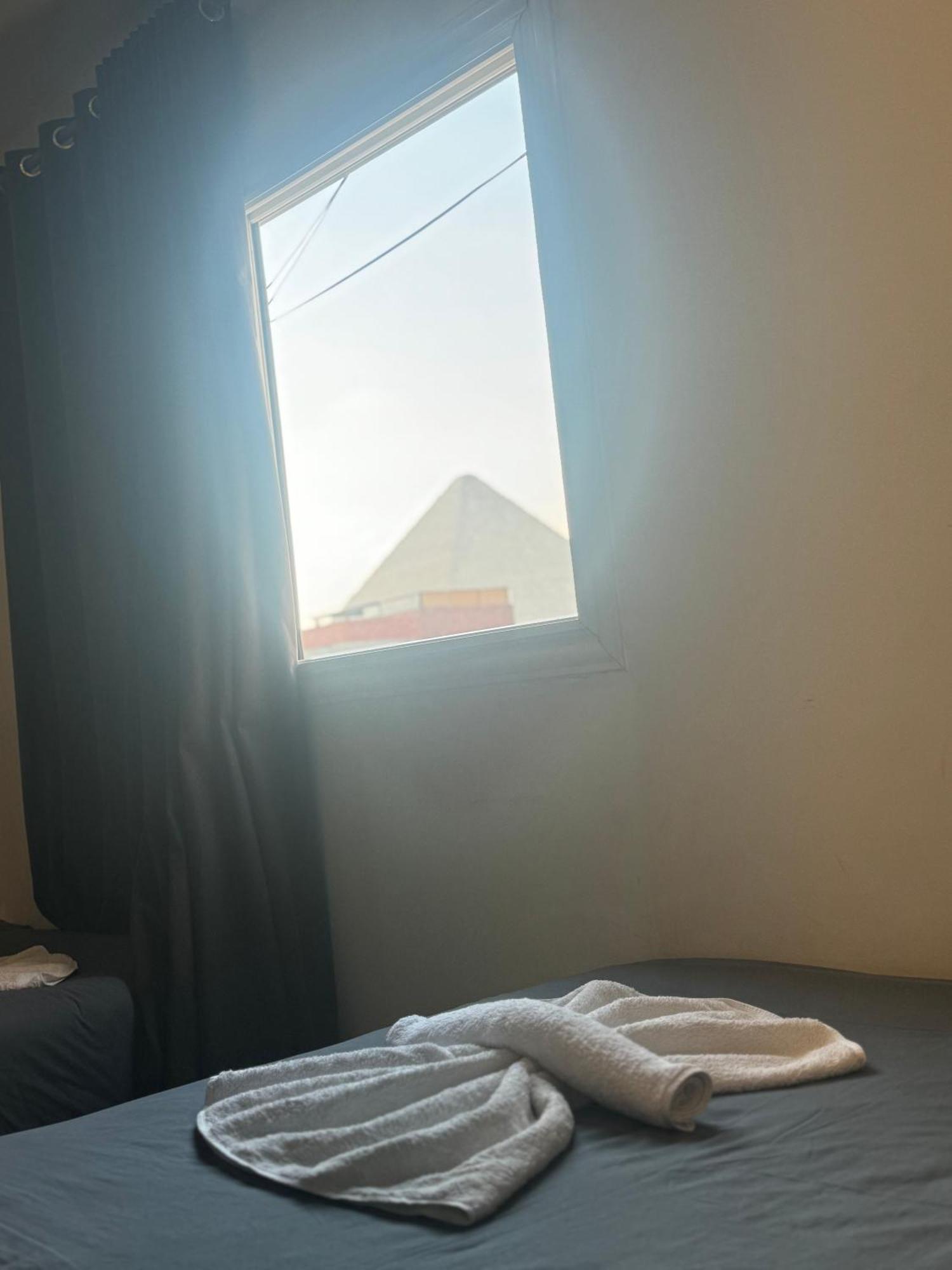 Pyramids And Sphinx Hotel Kafret el-Gabal Exterior foto