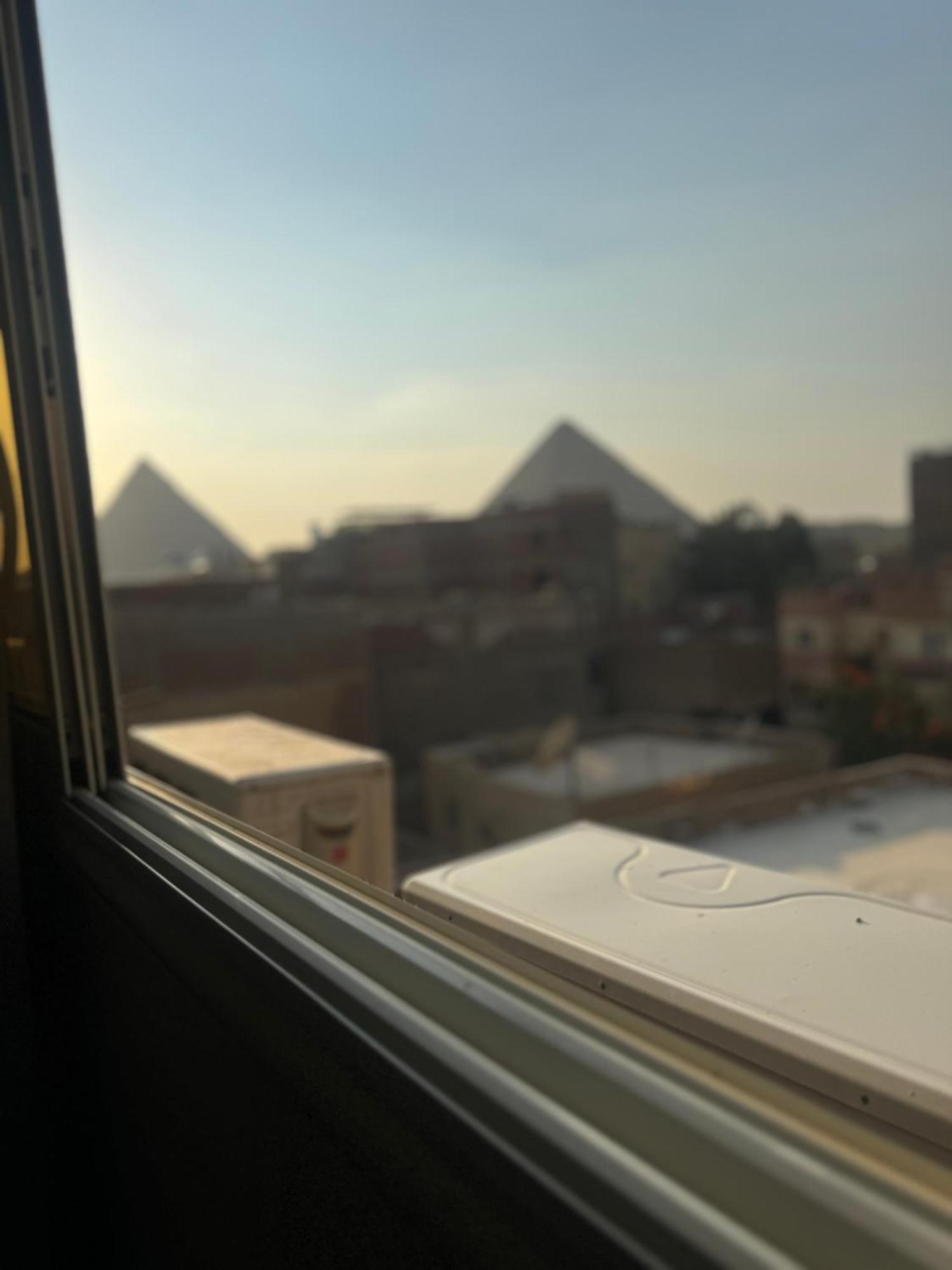 Pyramids And Sphinx Hotel Kafret el-Gabal Exterior foto